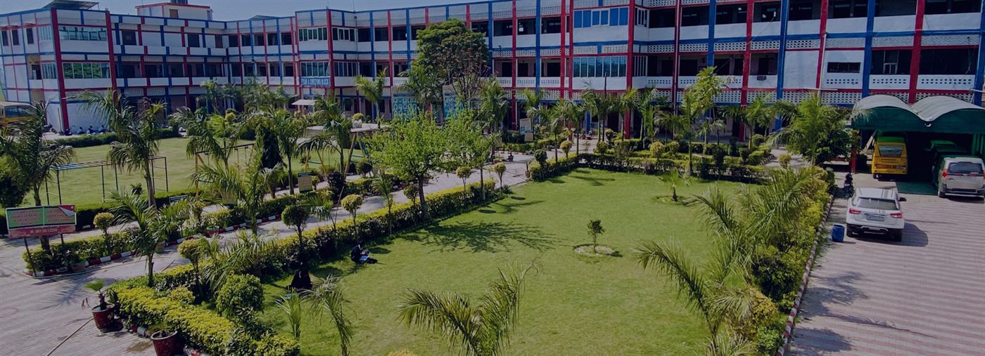 Aerial view of the school campus, lawns and playground