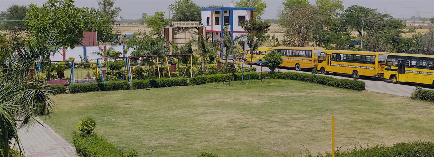 School entrance gate, playground and transport bay